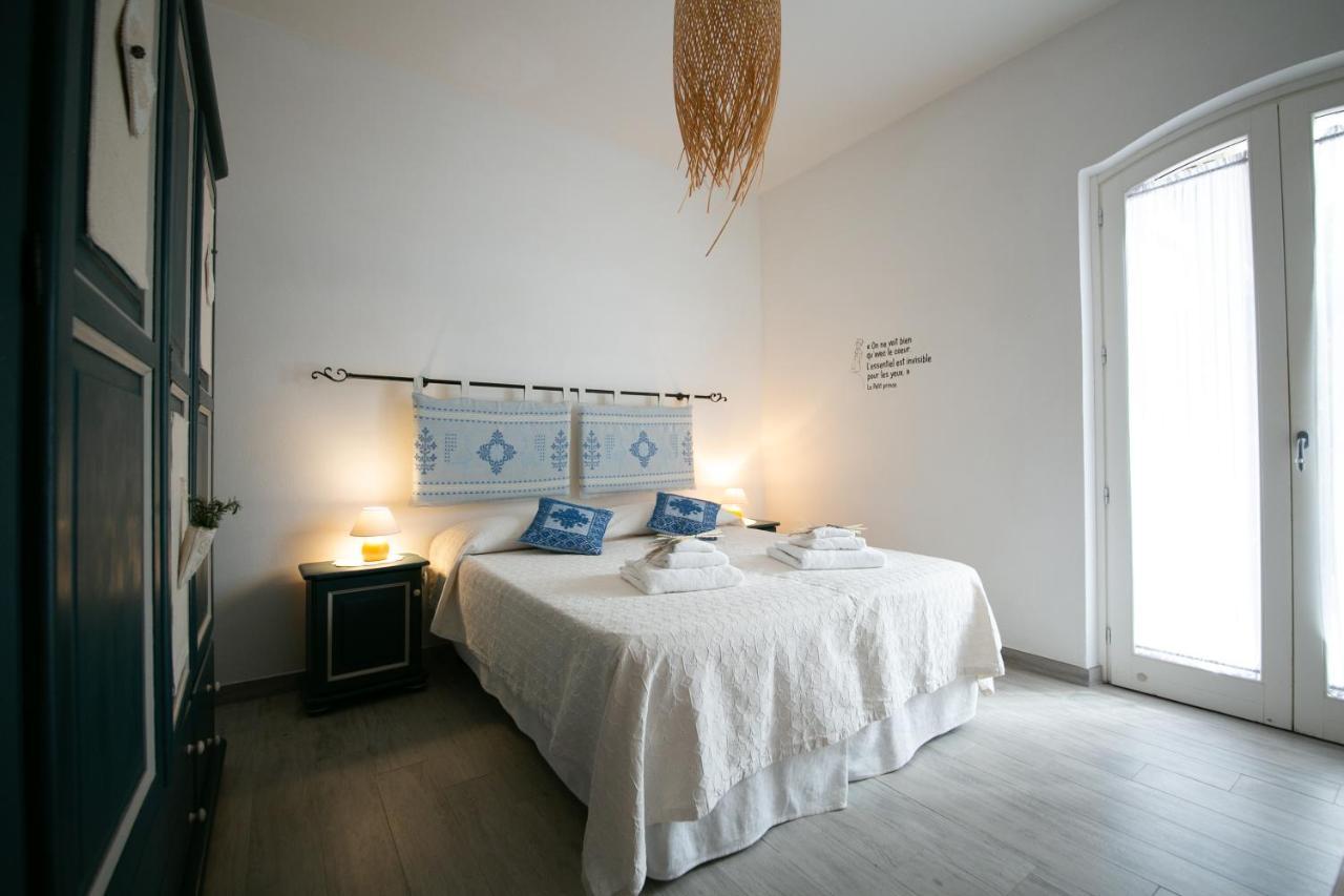 S'Arena Bianca Apartment Alghero Bagian luar foto